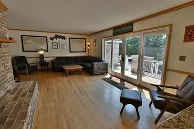 a living room with a couch and a table at Farmhouse in Hershey in Hershey