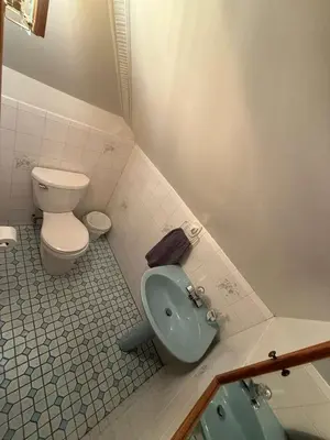 a bathroom with a toilet and a bidet at Cozy 3BR Apartment with Private Entry & Parking in Elizabeth, NJ in Elizabeth