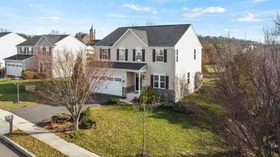an aerial view of a white house at Spacious & Serene Family Gem: Games, Office, Yard! in Pennsburg