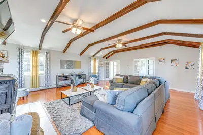 a living room with two couches and a fireplace at Game Room, Deck and Fire Pit Covington Township Gem in Daleville