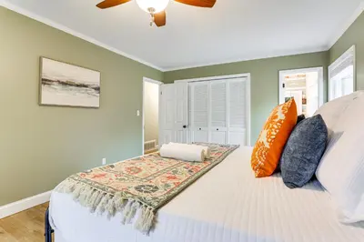 a bedroom with a bed and a ceiling fan at half Mi to Boat Ramp Lake Wallenpaupack Retreat! in Lakeville