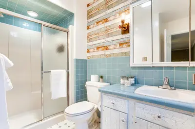a bathroom with a toilet and a sink and a shower at half Mi to Boat Ramp Lake Wallenpaupack Retreat! in Lakeville