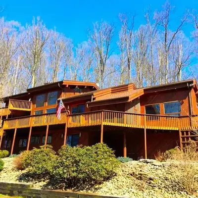 Stunning Cabin Rental with a Hot Tub Overlooking Fishing Creek near Sproul State Forest