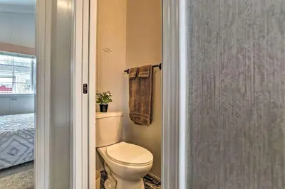 a bathroom with a toilet and a towel at Great Vacation Complex for the Best Pennsylvania Glamping in Scranton