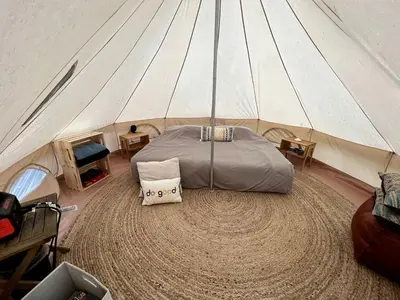 an overhead view of a bedroom in a tent at Amazing Equipped Bell Tent Nestled Among Nature in New York in Kerhonkson