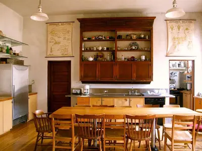 a kitchen with a large wooden table and chairs at Historic Vacation Rental with Music Studio in the Catskills near Hancock, New York in Hancock