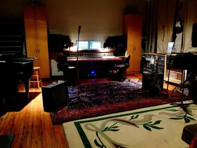 a living room with a piano and a rug at Historic Vacation Rental with Music Studio in the Catskills near Hancock, New York in Hancock