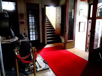 a hallway with a red carpet and a red rug at Historic Vacation Rental with Music Studio in the Catskills near Hancock, New York in Hancock