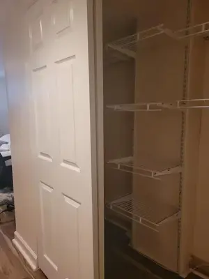 a closet with a white door and a white door at Staycation Suite in Philadelphia