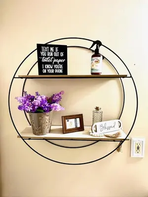 a round shelf with a sign and flowers on it at Masthope Heritage Chalet in Lackawaxen