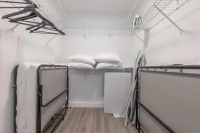 a room with two bunk beds in it at Opulence in Olive 4 bedrooms, 4 baths with 10 beds, Park 2 cars FREE in Orange