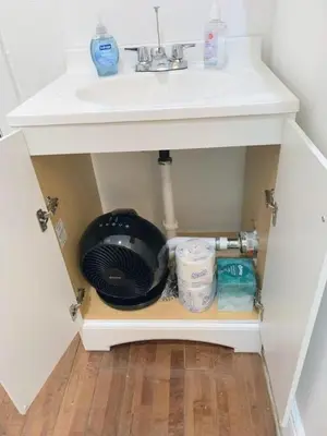 a bathroom vanity with a sink and a sink at Private room with Shared bath on Union Square 11 in New York
