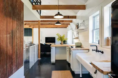 a kitchen with a sink and a counter top at FOUNDERS COTTAGE - 2 room with kitchennete in Kenoza Lake