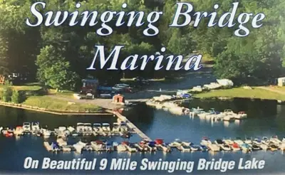 a book cover of a lake with a marina at Catskills Lakefront with Hot Tub, Sauna and Theater in Monticello