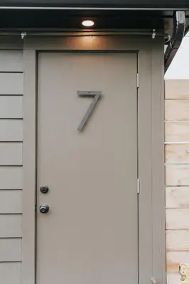 a clock on the door of a house at Luxury Cabin at Beaver Creek with hot tub and stunning views in Strasburg