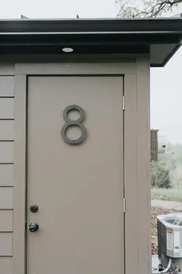 a number eight on a door of a house at Luxury Cabin at Beaver Creek with hot tub and stunning views in Strasburg