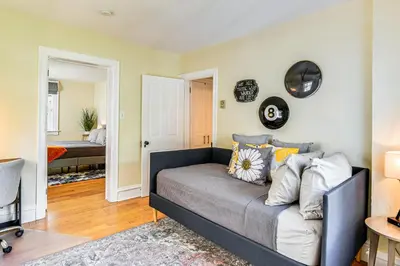 a living room with a couch and a bedroom at Near Nockamixon State Park Telford Apt with Porch! in Telford