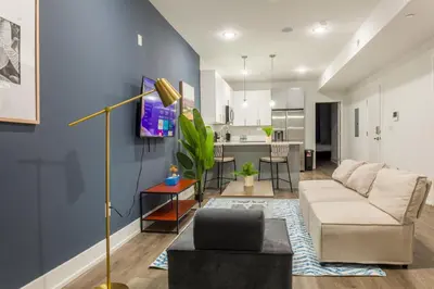 a living room with a couch and a table at 2BR2BA ApartmentWDWiFi Near Temple in Philadelphia