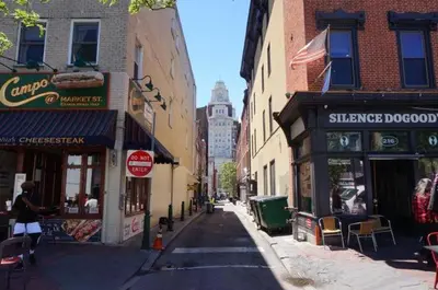a city street with shops and buildings on a city at Charming Philly Stay Walk to Liberty Bell & More in Philadelphia
