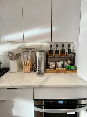 a kitchen counter with a coffee maker on it at Travelers Dream that's Mins to NYC having Game Room and Parking in Jersey City
