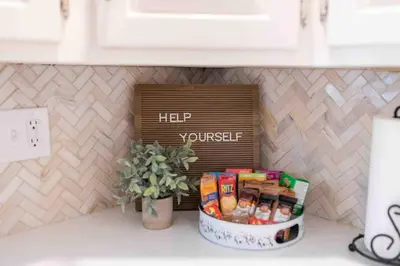 a box of food on a counter in a kitchen at Amish Guest House - hottub, patio, swing, ebikes in Gordonville