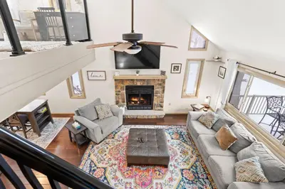 an overhead view of a living room with a fireplace at Vaulted Pines Lodge Hot Tub Game Room in Albrightsville