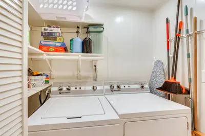 a kitchen with a white stove in a room at Steps to Susquehanna River Hot Tub Hideaway! in Dauphin