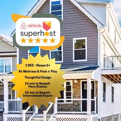 a house with a sign in front of it at 15% OFF | EWR| NYC | Metropolis Serenity Haven in Newark