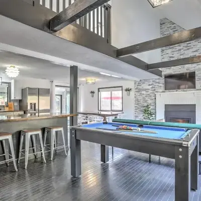 Modern 4 Bedroom Home with Sauna and Game Room in Gated Lake Community