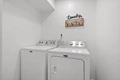 a white kitchen with a stove and a dishwasher at 3BD 102 Madison Ter in Springfield