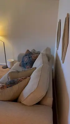 a couch with pillows on it in a room at Quiet Harrisburg home in Harrisburg