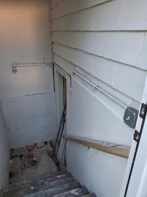 a refrigerator in a room with a wall at Quiet Harrisburg home in Harrisburg