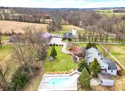 an aerial view of a home with a swimming pool at The Villa Farm