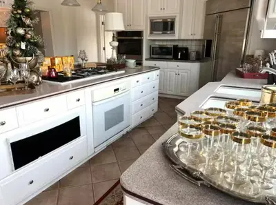 a kitchen with a counter with a christmas tree in it at The Villa Farm