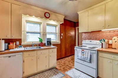 a kitchen with a stove and a sink at Home 7 Mi to Binghamton University! in Vestal