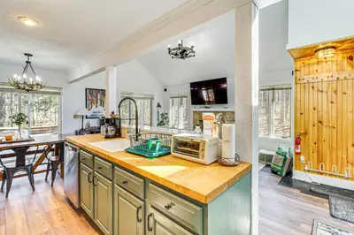 a kitchen with a counter with a microwave on it at Steps to Jack Frost Ski Resort Townhome with Decks in White Haven