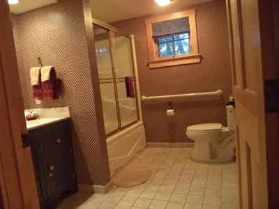 a bathroom with a shower and a toilet and a sink at The Inn & Spa at Intercourse Village in Intercourse
