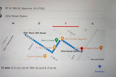 a screenshot of a google map of a train at Bunk Room Walk 2 Train Shops in Bayonne