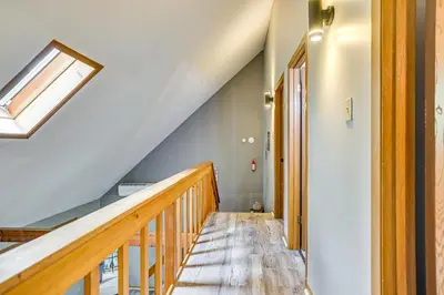 a staircase with a skylight in a house at Home with Fire Pit in Jim Thorpe 6 Mi to Dtwn! in Jim Thorpe