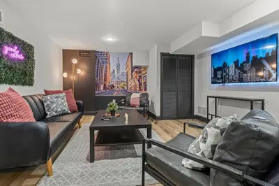 a living room with a couch and a table at Old City History Kid-Friendly 2BR 1,5BA in Philadelphia