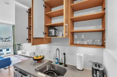 a kitchen with a sink and a counter top at Luxe Studio with City Views - Near Fishtown in Philadelphia