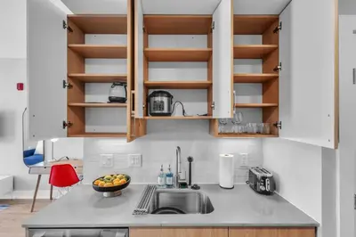 a kitchen with a sink and a counter top at Luxe Studio with City Views - Near Fishtown in Philadelphia