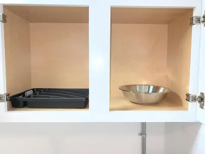 a kitchen with a bowl inside of a cabinet at Chelsea Studio-Shared Bathroom with Kitchen Twin Bunk Bed in New York
