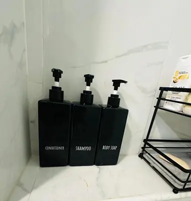 three bottles of soap sitting on a counter at Home in Philadelphia Stadium nearby in Philadelphia