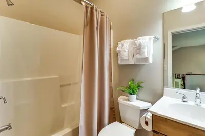 a bathroom with a toilet and a sink and a shower at Less Than 1 Mi to Big Boulder Mtn! Home with Hot Tub and Deck in Lake Harmony