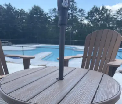 a wooden table with a parking meter on top of it at Masthope Retreat in Lackawaxen