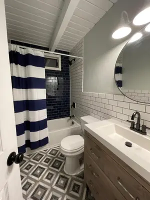 a bathroom with a toilet and a sink at Masthope Retreat in Lackawaxen
