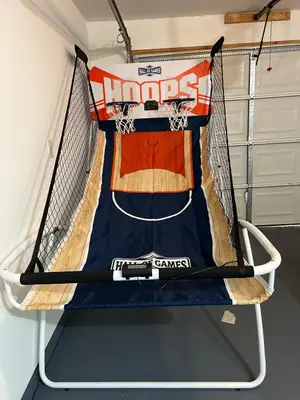 a basketball hoop with a jersey on it at Explore Poconos with Fire pit, Games, Grill in Tobyhanna