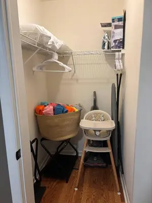a walk in closet with a basket and a shelf at Dine Outdoors, Dream Indoors 5BR in East Stroudsburg