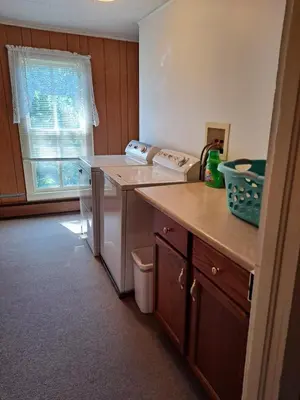 a kitchen with a counter and a dishwasher at The Canton House